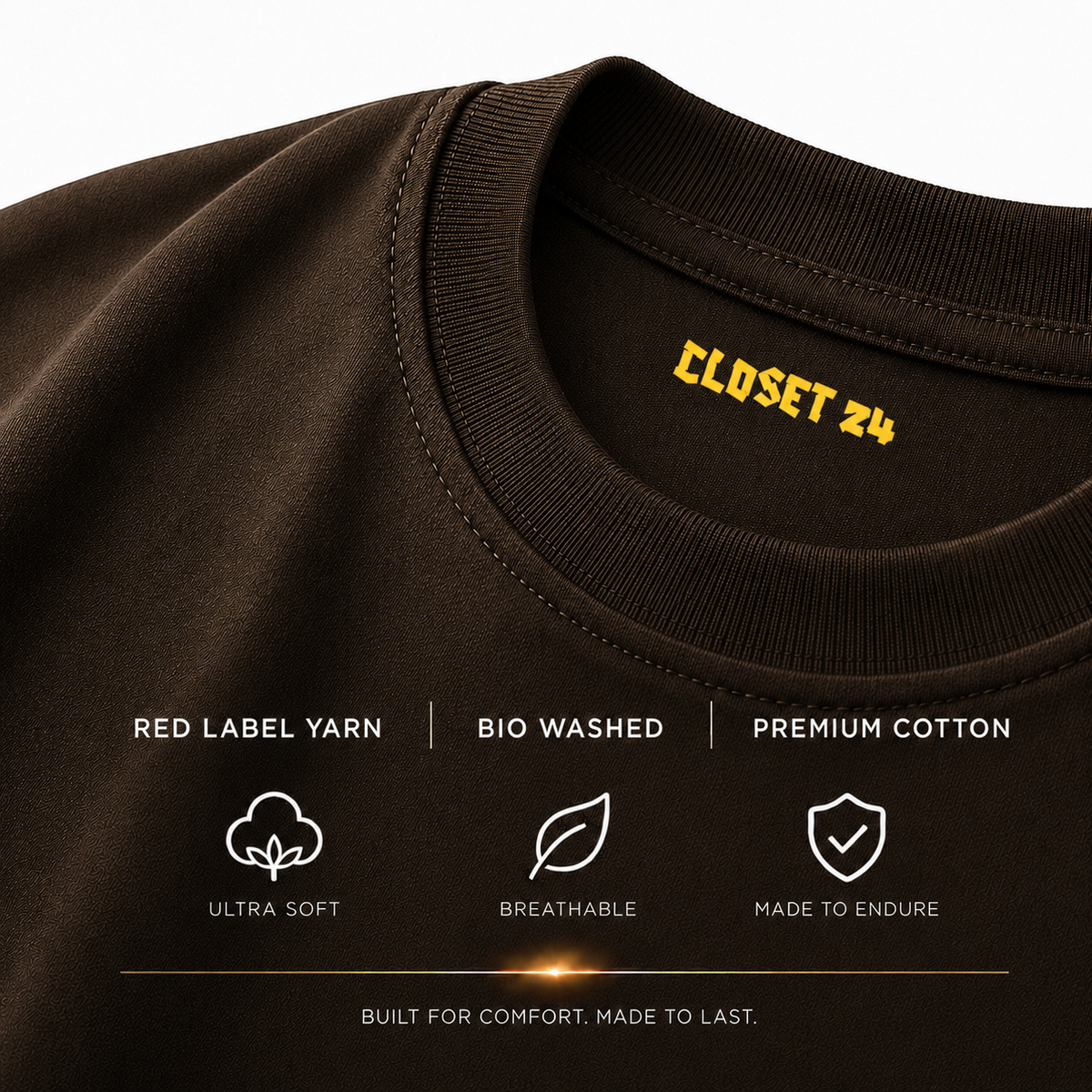 Close up of the brown cotton t shirt showcasing the CLOSET 24 neck print with Red Label Yarn and bio-washed fabric.