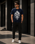 Indian model wearing a graphic printed T-shirt for men with a bold white gorilla design, paired with black cargo pants and white sneakers